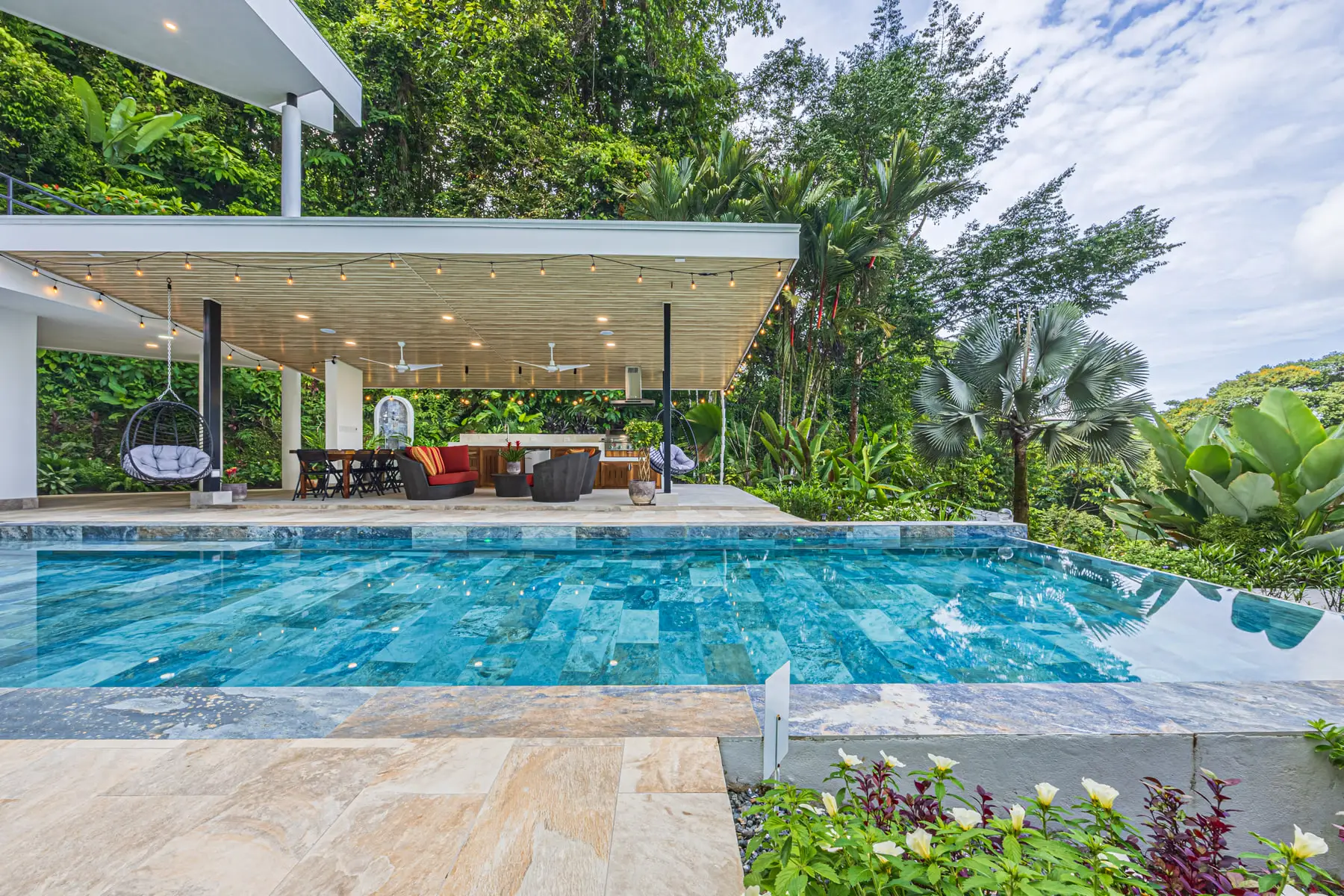 Sunlight moving across the stone tiles of the pool floor